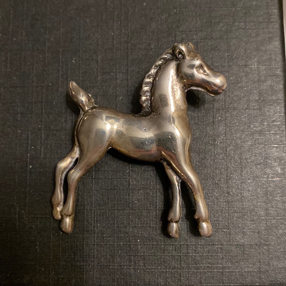 Silver horse pin